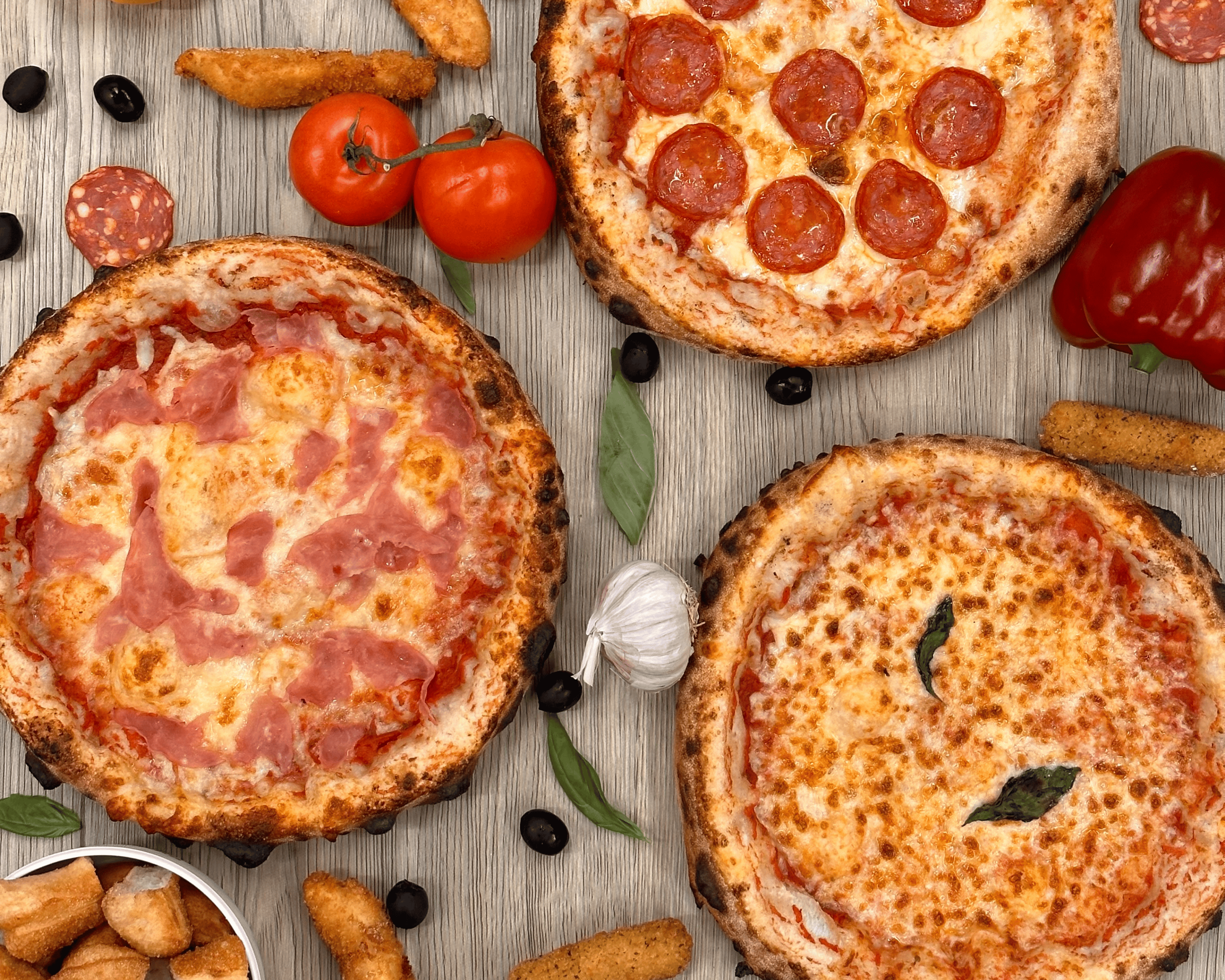 Community fundraising event at Amore Pizzeria with people sharing pizza together